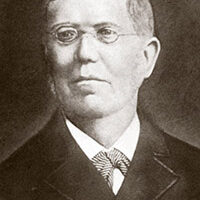 Das Bild zeigt den ehemaligen Bürgermeister Anton Franz mit runder kleiner Brille und Krawatte.
